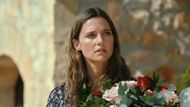 Lilli looks unsettled, a symbol of the lingering doubts and unresolved questions the ending leaves behind (Image via Netflix)